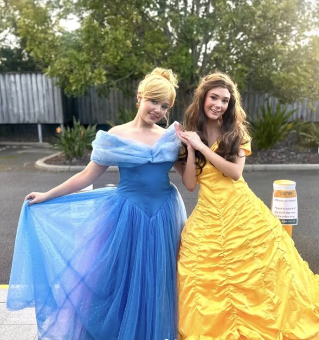 Indigo and Bridget in costume at a party