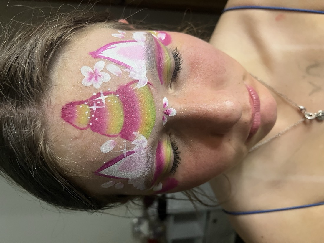 Rainbow unicorn crown face paint design